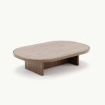 Ovale houten salontafel met moderne uitstraling, perfect voor eigentijdse woonkamers.