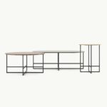 Drie minimalistische salontafels met metalen frames en houten bladen in verschillende maten, ideaal voor modern interieur.