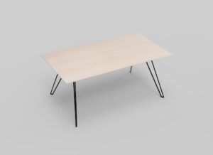 Een minimalistische rechthoekige tafel met een licht houten oppervlak en slanke zwarte metalen poten, tegen een effen grijze achtergrond.