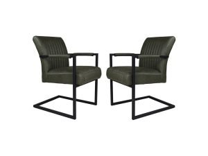 Twee groene fluwelen stoelen met zwarte metalen frames staan tegenover elkaar. Hun ontwerp heeft een cantileverbasis en verticale stiksels op de rugleuningen, wat zorgt voor een moderne en strakke uitstraling.