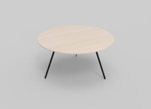 Een ronde houten tafel met vier slanke, zwarte metalen poten op een lichtgrijze achtergrond.