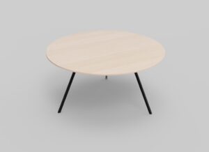 Een minimalistische ronde houten tafel met een lichtbeige blad en slanke zwarte metalen poten, geplaatst tegen een effen grijze achtergrond.
