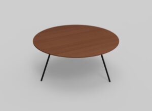 Een ronde houten tafel met vier slanke, zwarte metalen poten op een lichtgrijze achtergrond.