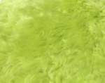 Close-up van een levendige, limoengroene, fuzzy textuur, die lijkt op pluizige vacht of een dikke, zachte stof. De afbeelding legt het rijke, pluche oppervlak van de textuur vast met licht en schaduw die diepte creëren.
