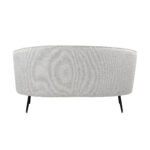 Moderne, ovale, witte poef met structuurstof en strakke, zwarte poten, gezien vanaf de zijkant.