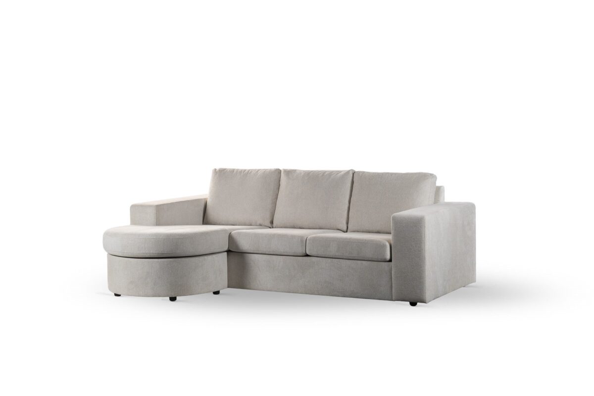 Beige 3-zitsbank CL L+R in stof Lord 22 (E460), met drie zit- en rugkussens, brede armleuningen en een aangehechte ronde voetenbank links, tegen een effen witte achtergrond.