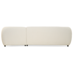 Minimalistische witte bank gezien vanaf de voorkant tegen een effen achtergrond. De bank heeft een modern design met gladde, afgeronde randen en is iets verhoogd door kleine, verborgen poten.