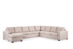 Beige L-vormige sectionele bank met een chaise longue aan de linkerkant, met zachte zit- en rugkussens. De bank heeft een minimalistisch ontwerp met donkere blokpoten en een strakke, moderne uitstraling tegen een effen witte achtergrond.