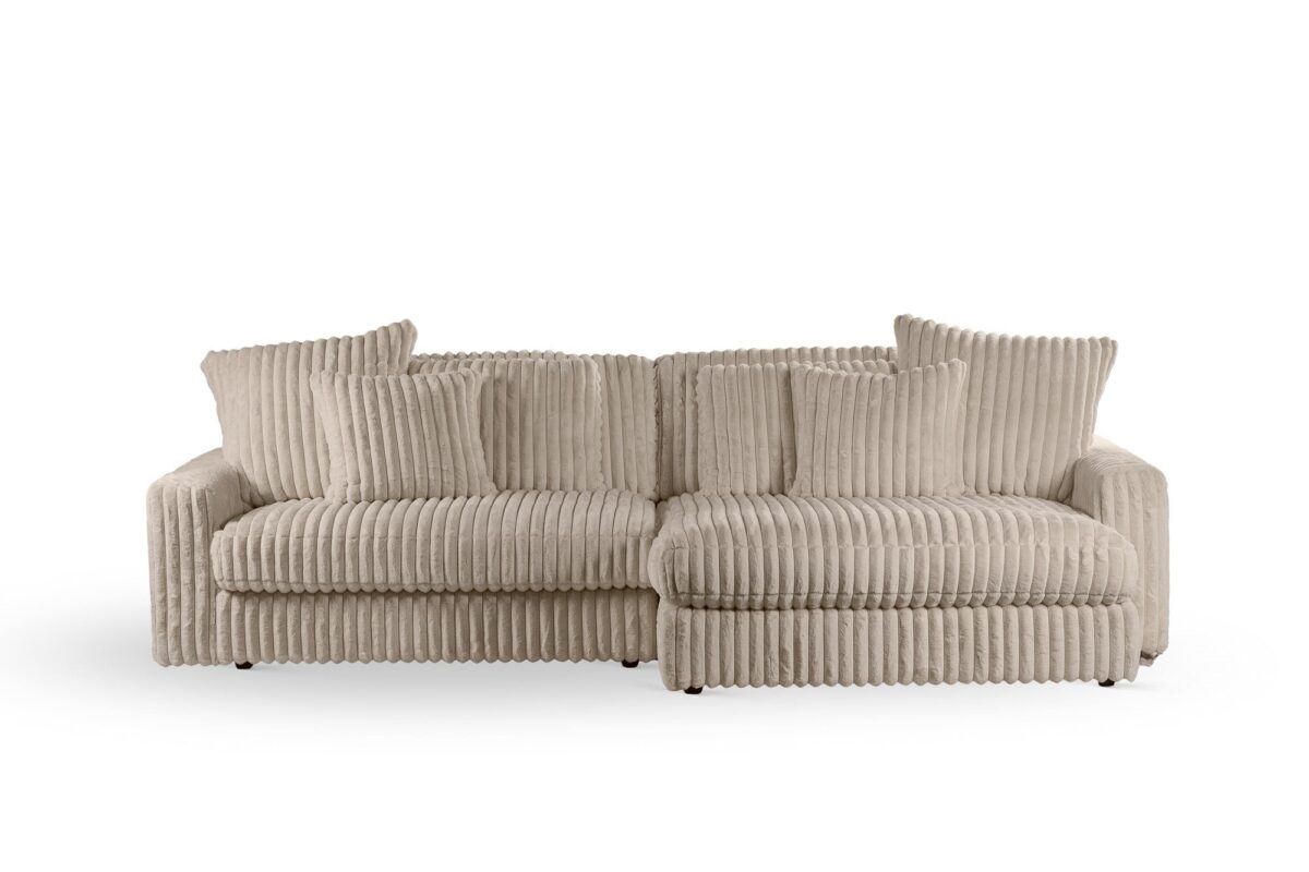 De 3 zits bank CL L+R in Vito 23 stof, D460 beige, heeft een ribfluwelen textuur, drie grote rugkussens en twee zijkussens, tegen een effen witte achtergrond.