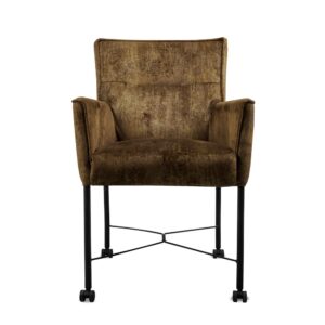 De Eetkamerstoel London Touch me 2 is een fauteuil met bruine fluwelen bekleding, slanke zwarte metalen poten en kleine wieltjes, afgebeeld met de voorkant naar voren tegen een witte achtergrond.