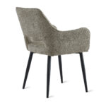 De Eetkamerstoel Ray - Taupe is een moderne fauteuil met een gestructureerde taupe bekleding en vier slanke zwarte metalen poten die schuin uit de rugleuning steken.