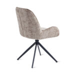 De Eetkamerstoel Lily - Taupe is een moderne stoel met een gebogen rugleuning en stoffen bekleding, voorzien van vier schuine zwarte metalen poten, vanaf de achterkant afgebeeld tegen een witte achtergrond.