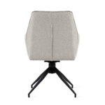 De Eetkamerstoel Jill Linnen Beige is een modern gestoffeerde stoel met een hoge rugleuning, van achteren gezien, en staat op vier naar buiten gebogen zwart metalen poten voor een stabiele ondersteuning.