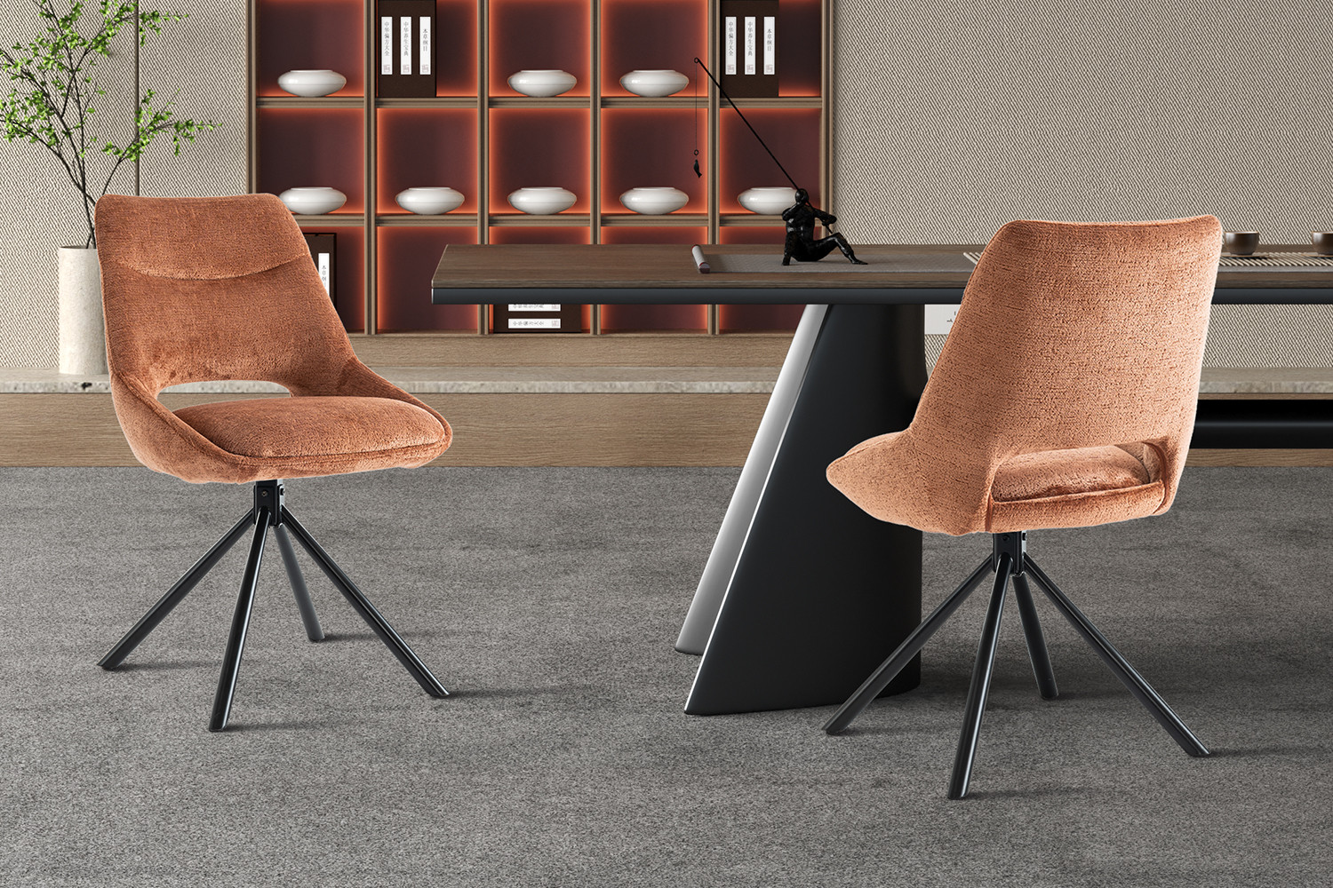 Twee oranje eetstoelen met een moderne uitstraling en zwarte metalen poten, geplaatst bij een tafel.