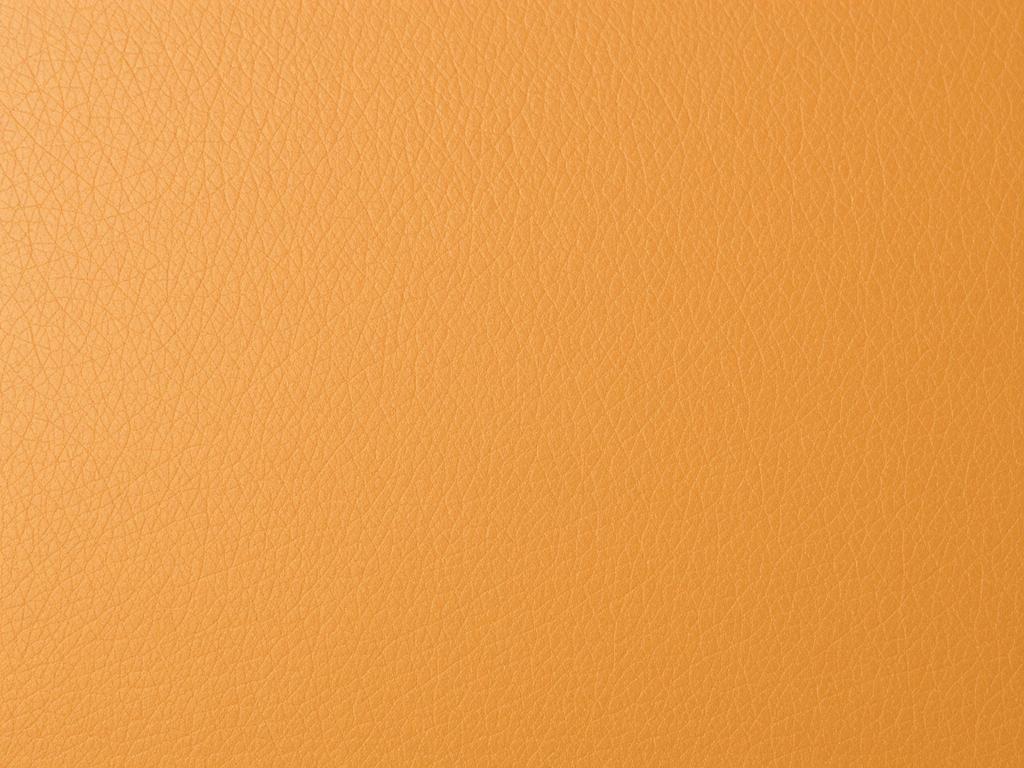 Close-up van gedekverfd leer textuur voor leren stoelen onderhoud Close-up van gedekverfd leer textuur voor leren stoelen onderhoud