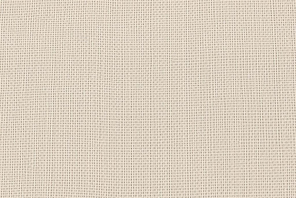 Close-up van linnen stof voor een eetkamerstoel met zichtbare natuurlijke textuur Close-up van linnen stof voor een eetkamerstoel met zichtbare natuurlijke textuur