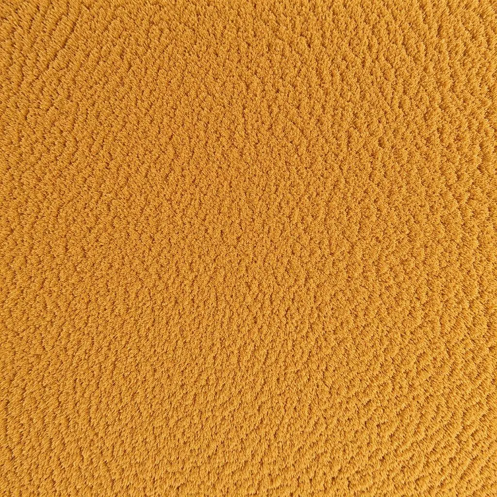 Close-up van suède textuur met zichtbare nap en matte afwerking Close-up van suède textuur met zichtbare nap en matte afwerking