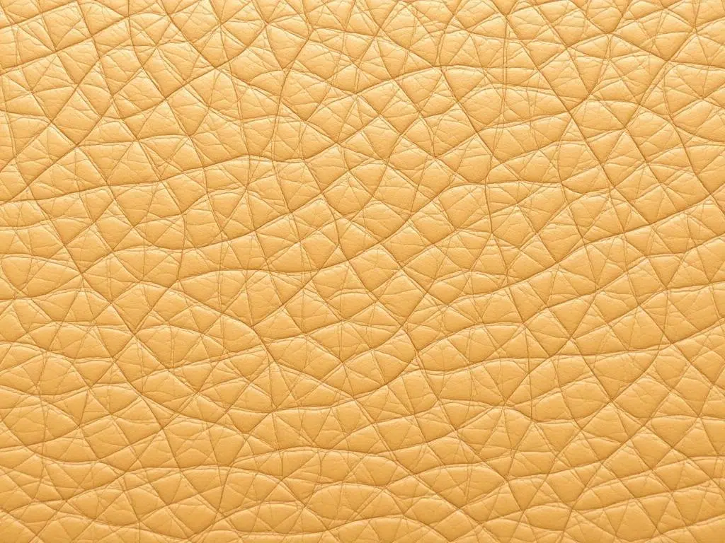 Close-up van vol-aniline leer textuur Close-up van vol-aniline leer textuur