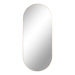 Jersey Mirror Oval is een ovale spiegel met een lijst in messing-look van 35x80 cm tegen een witte achtergrond.