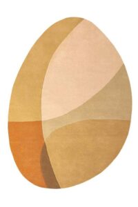 De Shades 510 Gold 200x290 Pebble is een ovaal vloerkleed met abstracte, overlappende secties in beige, tan, bruin, perzik en oranje tinten, met geometrische kleurblokken die lijken op een ei.