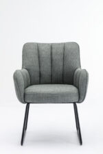 De Stoel Kevin Bjorn Fabric Mint is een moderne mintkleurig gestoffeerde fauteuil met zwarte metalen poten, een licht gebogen rug en gevoerde armen voor comfort, tegen een effen witte achtergrond.