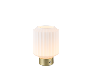 De REALITY Tafellamp LORD heeft een matte geribbelde cilindrische glazen kap en een geborsteld gouden metalen voet, die een zacht, warm licht geeft.