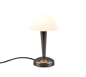 De REALITY Tafellamp CANARIA heeft een modern ontwerp met een ronde witte glazen kap, een metalen kegelvormige voet op een cirkelvormig plateau en een zwart netsnoer dat naar links uitsteekt.