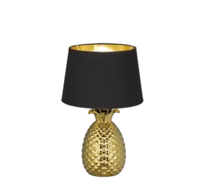De REALITY Tafellamp PINEAPPLE heeft een gouden ananasvormige voet en een zwarte lampenkap met een gouden binnenvoering.