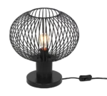 De TRIO Tafellamp Gila heeft een modern ontwerp met een ronde, open kap van zwart metaaldraad die de lamp onthult, op een ronde voet met een aangesloten netsnoer en schakelaar.