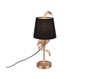 De REALITY Tafellamp LOLA is een decoratieve tafellamp met een gouden flamingovormige voet die op één poot staat, met zijn kop en nek gebogen boven een zwarte lampenkap.
