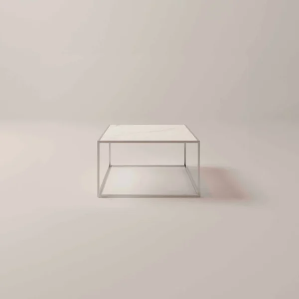 De Reality Tafellamp Diaz is een eenvoudige, moderne tafellamp met een beige cilindrische voet en bijpassende kegelvormige lampenkap, zacht verlicht tegen een witte achtergrond.