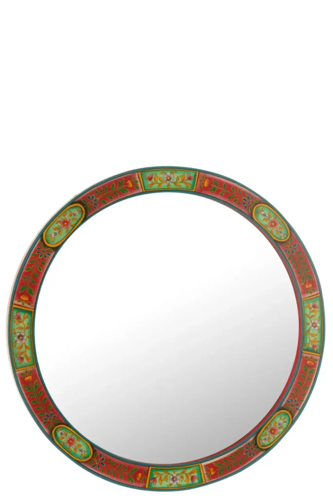 De Mirror Round Frame Mumbai MDF Mix heeft een decoratieve ronde lijst met rode, groene en gele bloemmotieven op een witte achtergrond.