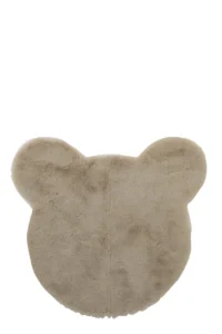De Vloerkleed Hoofd Beer Polyester Beige is een pluche, beige mat in de vorm van een berenhoofd met twee afgeronde oren en een zachte, donzige textuur, afgebeeld tegen een witte achtergrond.