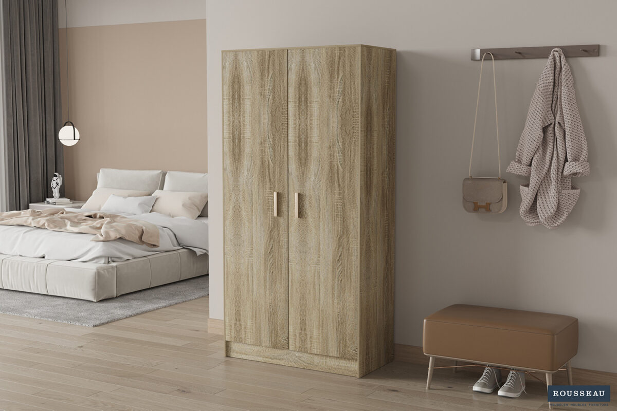 Een moderne slaapkamer met een bed, SALE - Opbergkast 'Space' 2 deuren en 4 legplanken Sonoma, bank, wandhaken met een tas en jas, en neutrale inrichting. Een lichte houten vloer en zachte verlichting zorgen voor extra gezelligheid.