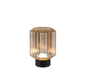 De REALITY Tafellamp LORD heeft een modern ontwerp met een cilindrische geribbelde glazen kap, zwarte ronde voet en straalt een warm licht uit.