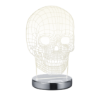 De REALITY Tafellamp SKULL heeft een 3D draadframe menselijke schedel verlicht met een geelachtige gloed, rechtop gemonteerd op een ronde metalen voet.