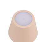Een minimale, beige, kegelvormige tafellamp genaamd "Reality Diaz" met een ronde witte bovenkant, van bovenaf gezien tegen een witte achtergrond. Het gladde ontwerp lijkt op een kleine decoratieve lamp of container.