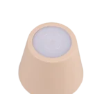 Een minimale, beige, kegelvormige tafellamp genaamd "Reality Diaz" met een ronde witte bovenkant, van bovenaf gezien tegen een witte achtergrond. Het gladde ontwerp lijkt op een kleine decoratieve lamp of container.