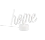 De REALITY Tafellamp CASA is een witte neonlamp met de tekst "home", gemonteerd op een ronde witte voet met een zichtbaar netsnoer, tegen een effen witte achtergrond.