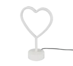 De REALITY Tafellamp HEART is een witte tafellamp met een hartvormige lichtbuis en een ronde voet, die wordt gecompleteerd door een zwart netsnoer dat uit de voet steekt.