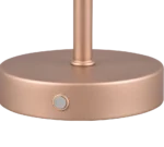 Een close-up van de ronde, metallic roségouden voet van de REALITY Tafellamp JEFF, met een kleine ronde knop aan de zijkant.