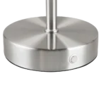 Close-up van de REALITY Tafellamp JEFF met een geborstelde metalen voet met een rond, plat oppervlak, een kleine witte zijknop en een centrale metalen staaf die omhoog steekt.