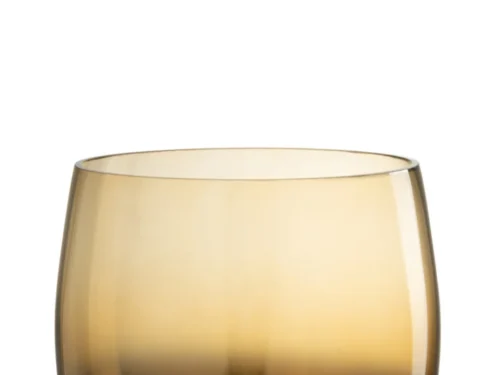 De Kaarsenhouder Orkaan Glas Rook Geel Groot is een ronde, doorschijnende glazen kandelaar met een korte voet en een kleurverloop van rookgrijs aan de onderkant naar amberkleurig aan de bovenkant, afgebeeld op een witte achtergrond.
