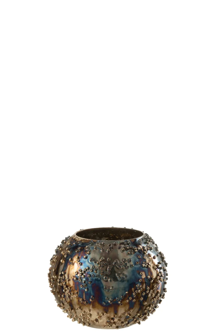 Theelichthouder Lise Glas Bruin Goud Klein is een kleine, ronde kandelaar met een metallic afwerking in bruin en goud, met een iriserende look en clusters van verhoogde kralen op het oppervlak.