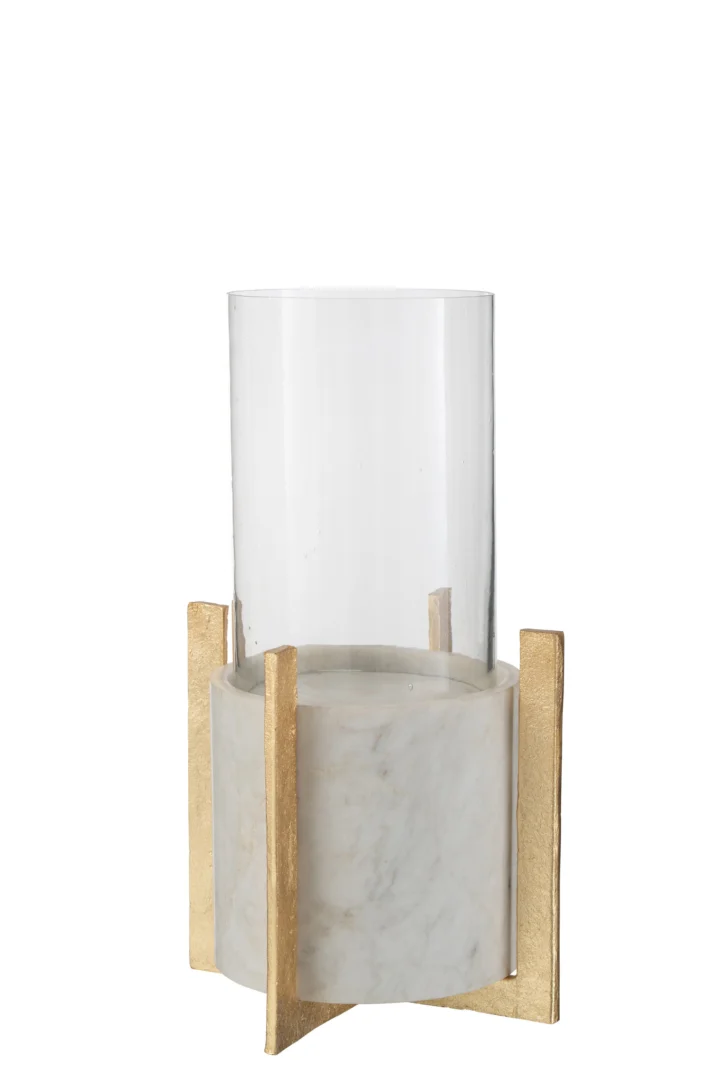 De Kaarsenhouder Marmer Glas Groot - Theelichthouder heeft een modern, minimalistisch cilindrisch glas met een wit marmeren voet, ondersteund door vier goudkleurige metalen poten die boven de voet uitsteken.