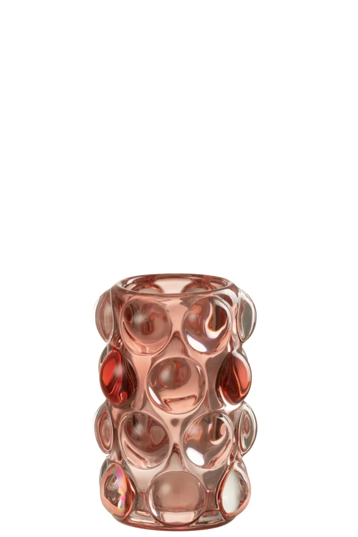 Theelichthouder Bollie Glas Rood is een cilindrische glazen kandelaar met een rode tint en een gestructureerd oppervlak van verhoogde, heldere luchtbelachtige cirkels die de buitenkant bedekken.
