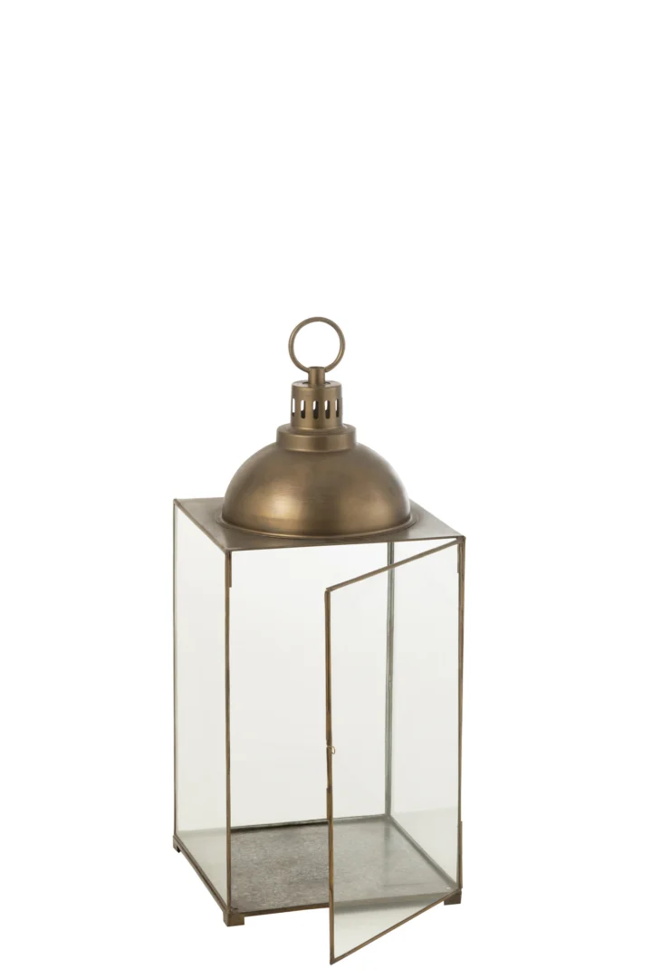 De Lantaarn Hagrid Glas IJzer Brons Middel is een rechthoekige glazen lantaarn met een bronzen ijzeren frame, gewelfde bovenkant, ronde handgreep en een te openen klapdeurtje aan één kant.