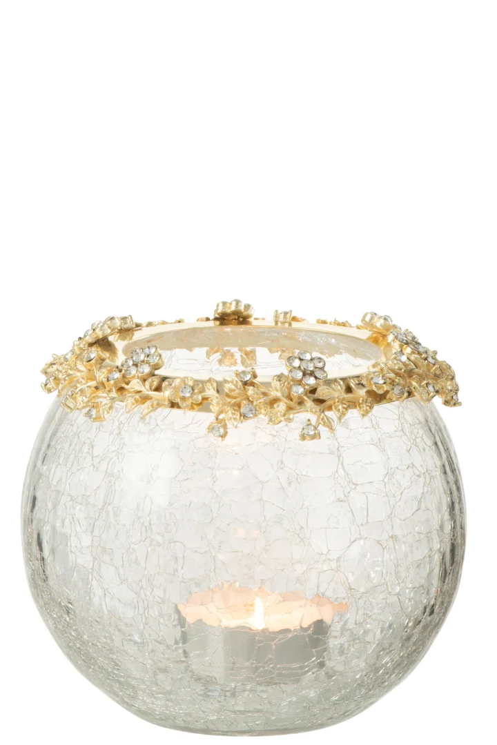 De Theelichthouder Volve Metaal Glas Goud Transparant Groot is een ronde votief van gebarsten glas met een sierlijke gouden rand versierd met parelmoeren en kristallen accenten, met daarin een brandend waxinelichtje.