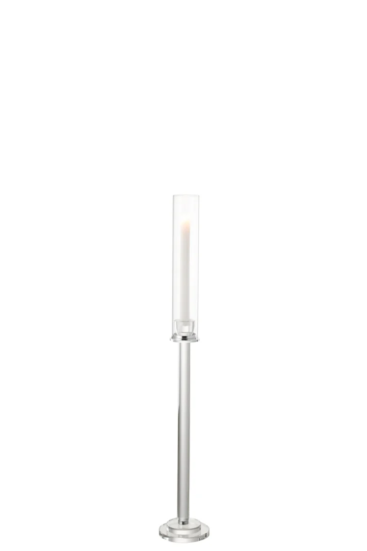 De Kaarsenhouder Moira Glas Transparant Klein is een hoge kandelaar van helder glas en metaal met een cilindrisch deksel en een witte conische kaars erin, afgebeeld tegen een effen witte achtergrond.