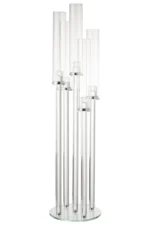 De Kaarsenhouder 5 Dun Glas Transparant is een modern decoratief object met meerdere hoge, heldere cilindrische glazen buizen van verschillende hoogtes die rechtop staan op een ronde transparante basis.